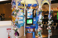 The booth of TBS TV programs of Friday with preserved blue roses